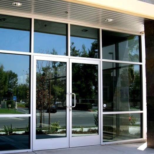 Commercial glass storefront doors serviced by USA Doors